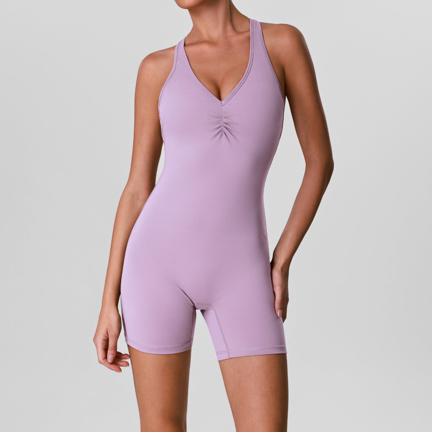 V-neck jumpsuit with chest cushion and quick drying yoga shorts